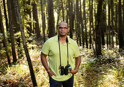 Stephen Lanham standing in the woods