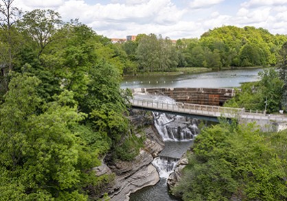 waterfall below bridge