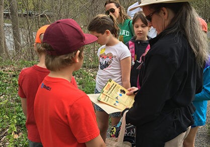 Kids exploring wildflowers