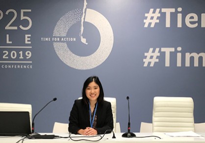 Alice Soewito sitting at a desk